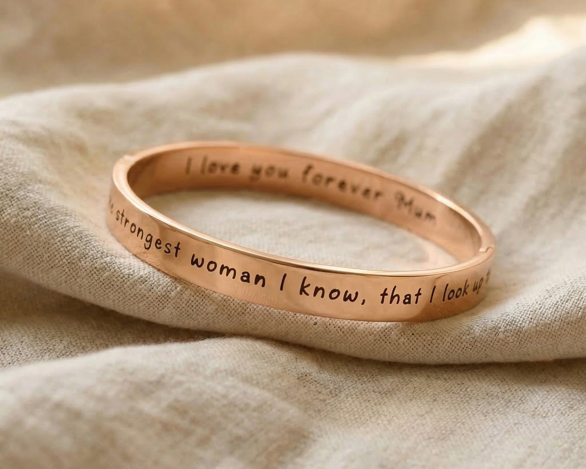 Personalised promise bangle in rose gold with engraved message, refined jewellery design