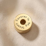 Round cremation charm for Moments Bracelet designed to hold ashes as a sentimental memorial keepsake