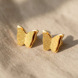 Sparkling butterfly earrings in gold with textured detail, symbolic jewellery gift for her