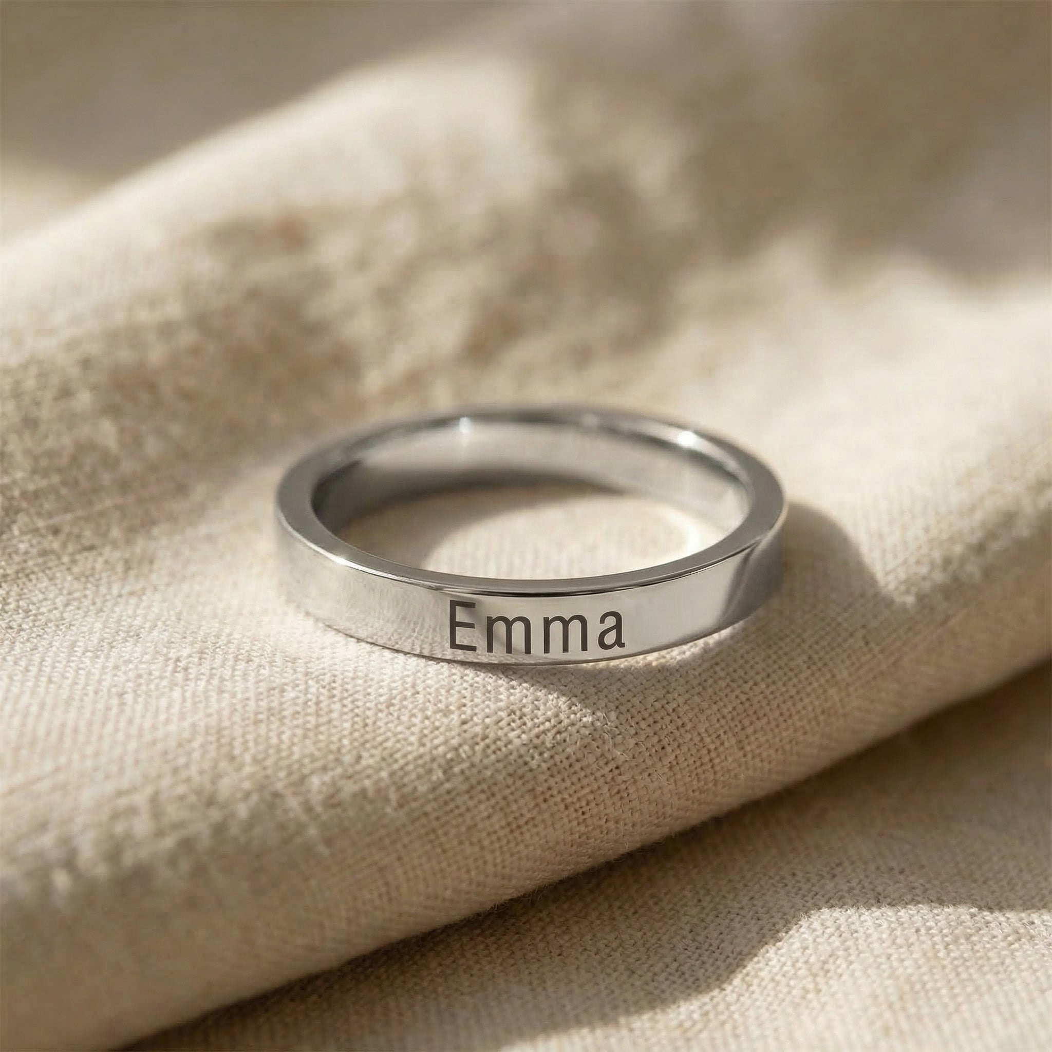 Personalised stackable ring in silver with engraved name, simple and elegant style
