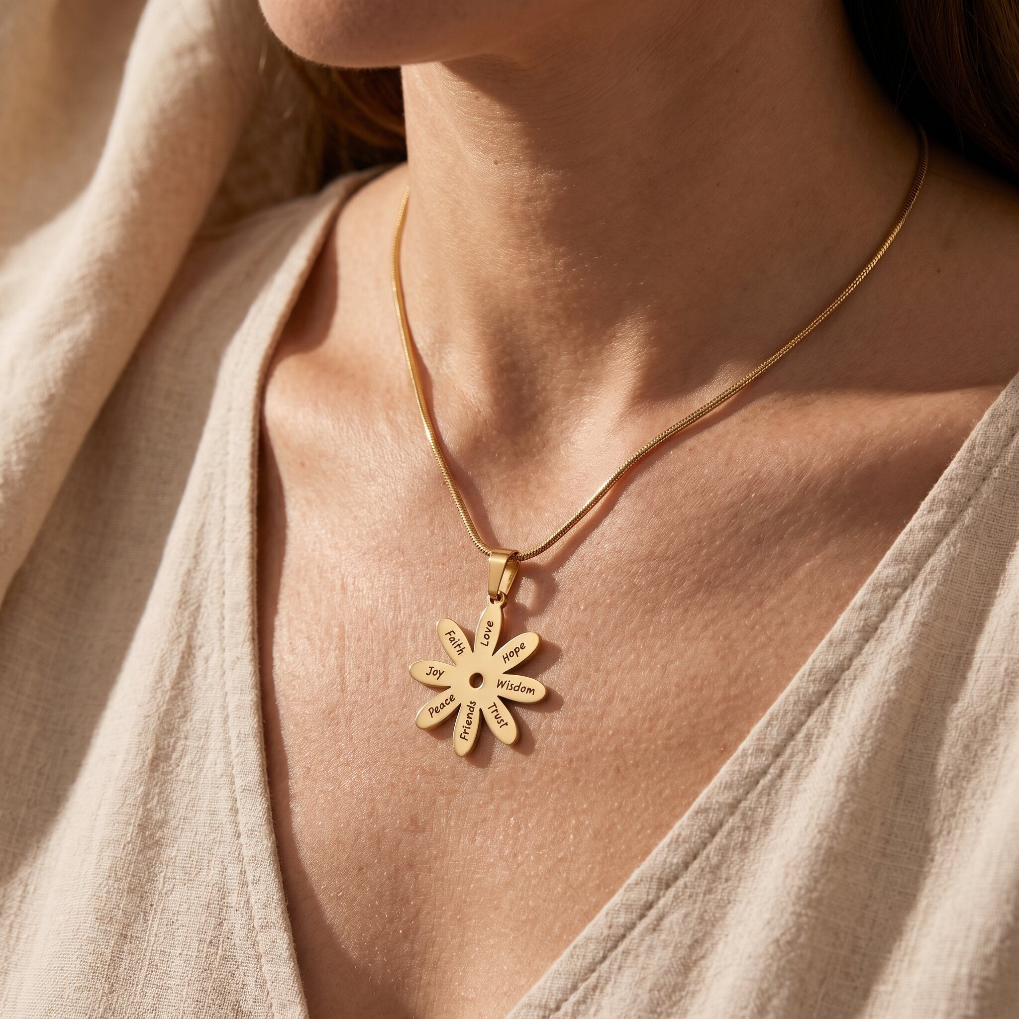 Woman wearing sunflower necklace, symbolic jewellery representing happiness, love and family connection
