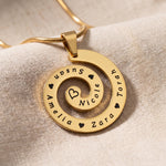 Swirl of time necklace in gold with engraved symbolic design, meaningful keepsake jewellery gift