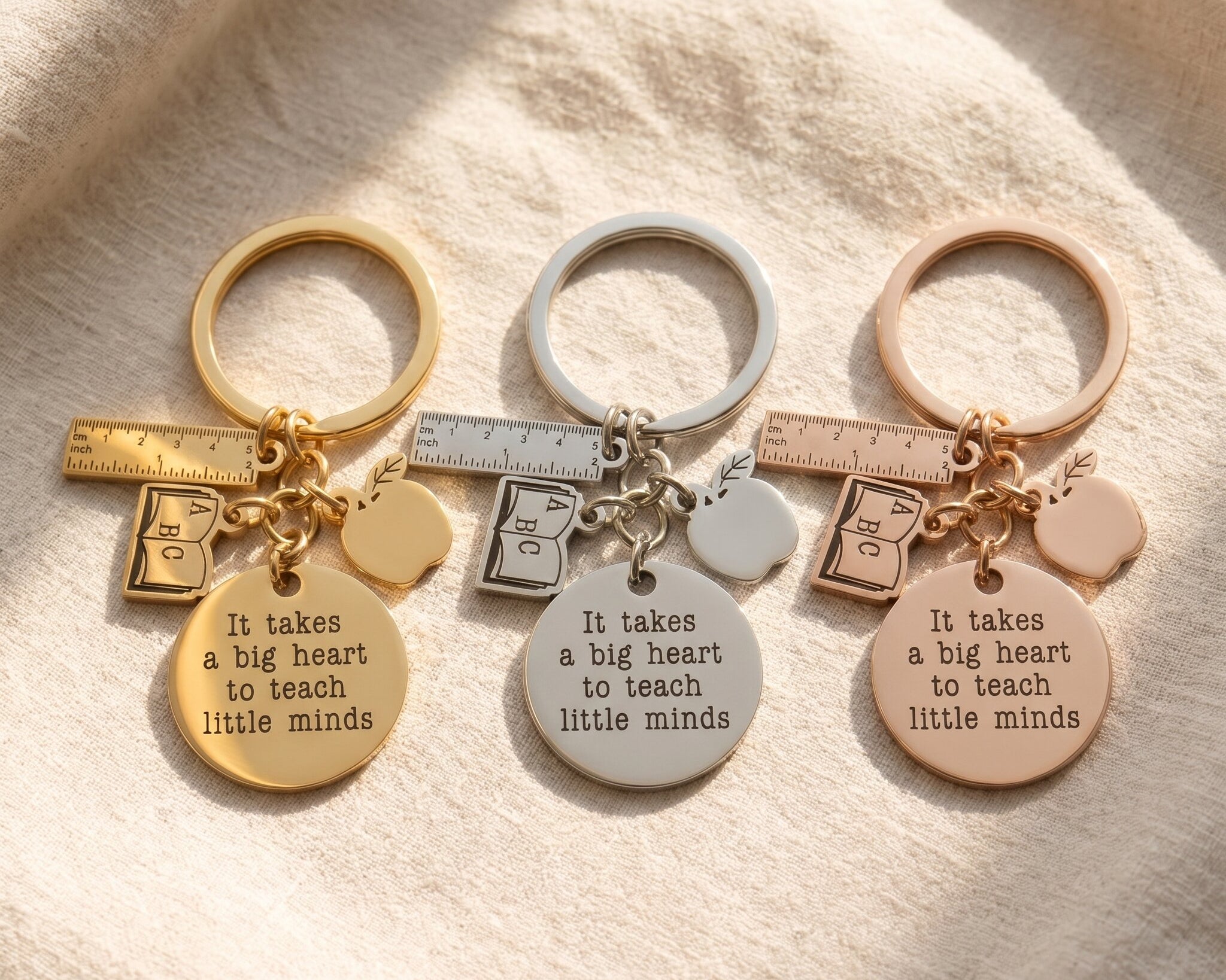 Teacher life keyring tone comparison showing gold, silver and rose gold engraved appreciation gift finishes