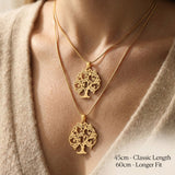 Tree of life necklace worn showing chain length and pendant size on neckline