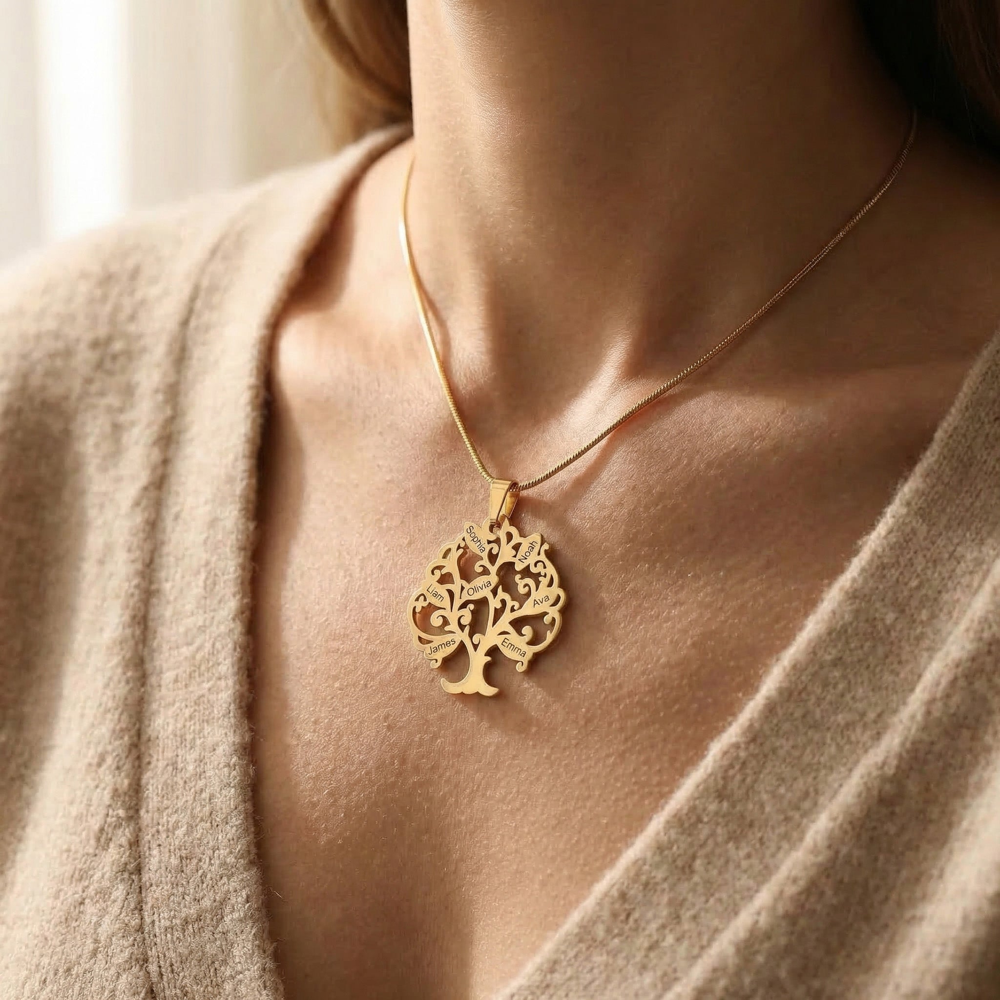Woman wearing tree of life necklace, meaningful everyday jewellery style