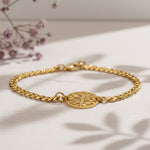 Gold Tree of Life bracelet by Belle Fever with detailed round charm design. Nature inspired jewellery.