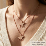 Unicorn name necklace worn showing chain length with personalised name detail