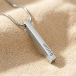 Silver vertical bar necklace with engraved bar pendant on delicate chain